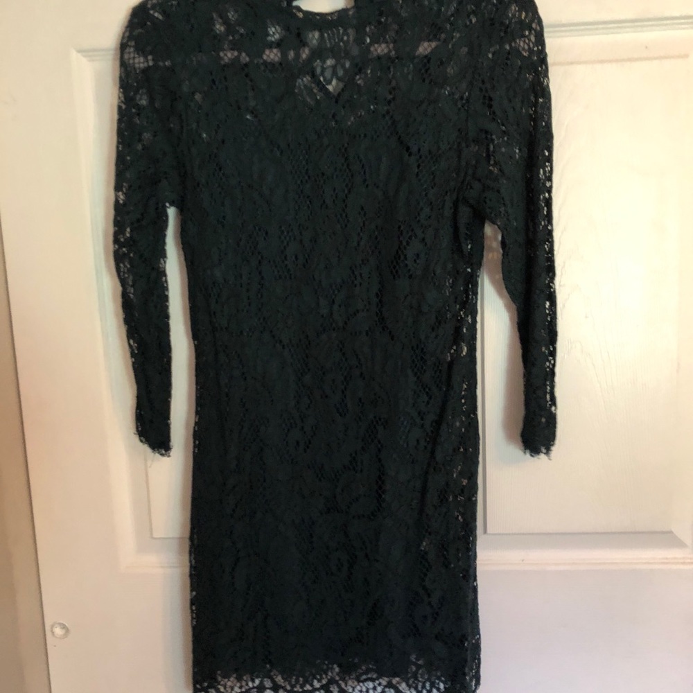 Deep green lace dress.